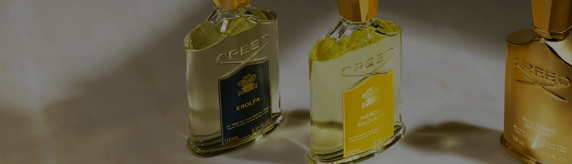 Erolfa, Neroli Sauvage & Millesime Imperial on marble
